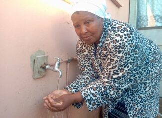 Neliswa Mnikina of Chris Hani in KwaNobuhle, Kariega, has one of only four RDP houses with running water. She said she can’t supply the whole area. Photos: Thamsanqa Mbovane
