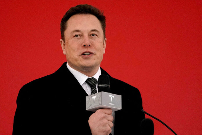 FILE PHOTO: Tesla CEO Elon Musk attends the Tesla Shanghai Gigafactory groundbreaking ceremony in Shanghai Twitter Vows Legal Fight After Elon Musk Torpedoes $44-Billion Deal
