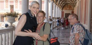 Princess Charlene Delights Tourists at Monaco Palace with Surprise Appearance