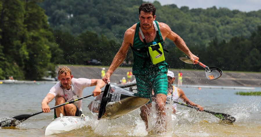 Andy Birkett leads the front bunch into a portage en route to winning the gold medal in the men's marathon final at the Oak Mountain State Park at the World Games on Tuesday. Photo: Balint Vekassy/ ICF