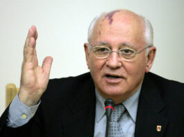 Former Soviet Union President Gorbachev speaks at a meeting with former US President Bush in Moscow