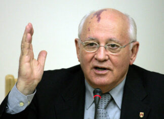 Former Soviet Union President Gorbachev speaks at a meeting with former US President Bush in Moscow