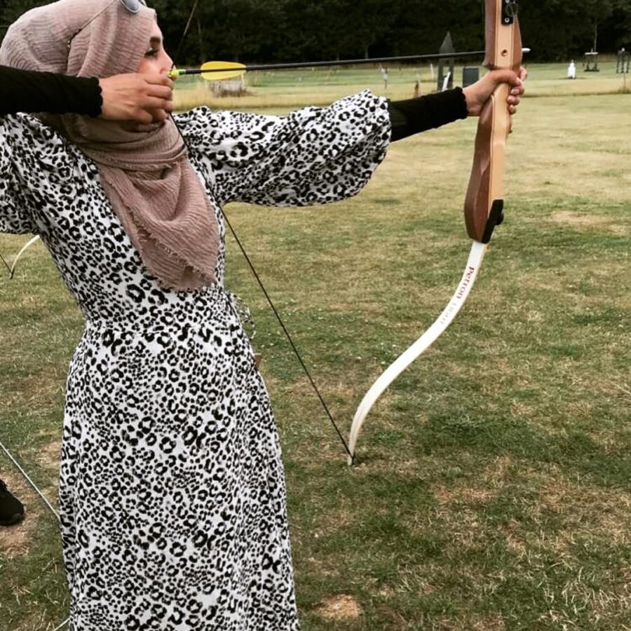 Fatima tries her hand at archery