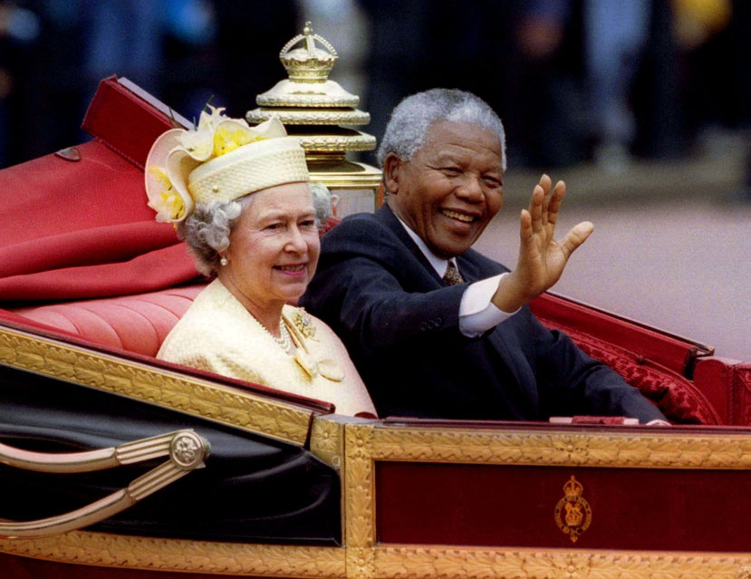 FILE PHOTO: Britain's Queen Elizabeth and South African President Nelson Mandela