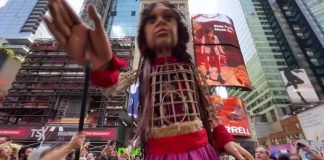 Giant refugee puppet 'Little Amal' welcomes 'the huddled masses' in New York City's Times Square