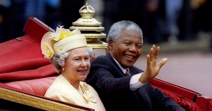 Queen-Elizabeth-with-Nelson-Mandela FILE PHOTO: South African President Nelson Mandela is accompanied by Britain's Queen Elizabeth II in a carriage ride to a Buckingham Palace lunch during his state visit, in London, Britain July 9, 1996. REUTERS/Simon Kreitem