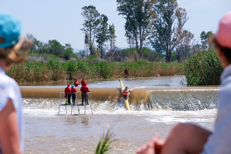 Watched by crowds on the banks, race winner Andy Birkett negotiates Cradock Weir on final stage of the 2022 Fish River Canoe Marathon on Saturday.