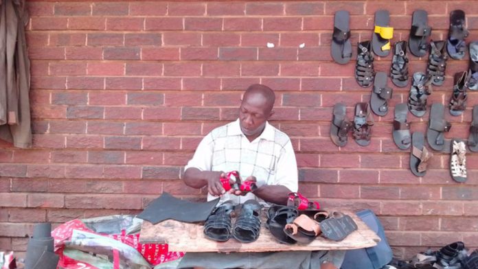 eric_poku_3_extra_large Meet Eric Paku, the “Shoe Doctor” of Central Pretoria