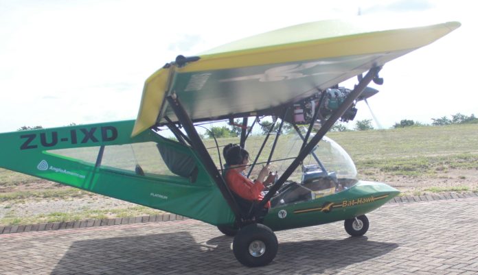 PHOTO 4 - BAT HAWK LIGHT AIRCRAFT HANDOVER- Minister Creecy tests out one of the Bat Hawk Light Aircraft