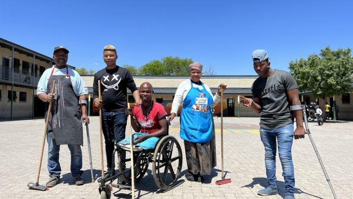 disabled Dunoon residents From left to right: John Beto, Sinoxolo Tofi, Baithuti Sasha, Else Beto and Thobani Ngenjani are among a group of disabled residents in Dunoon who are taking up the task to be cleaners at a local school for six months. Photo: Peter Luhanga