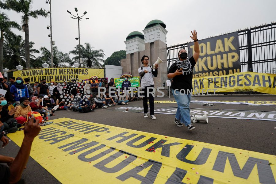 People protest against a new criminal code in Jakarta