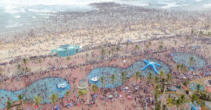 Durban-coastline-beachfront-New-Year Thousands of New Year party revellers and holidaymakers on North Pier Beach in 2016. Rajesh Jantilal/AFP via Getty Images