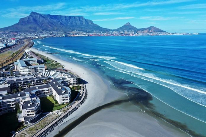 Milner lagoon gup Drone footage from 25 November shows polluted black water from the Diep River estuary flowing into the sea at Milnerton. Photo: Supplied