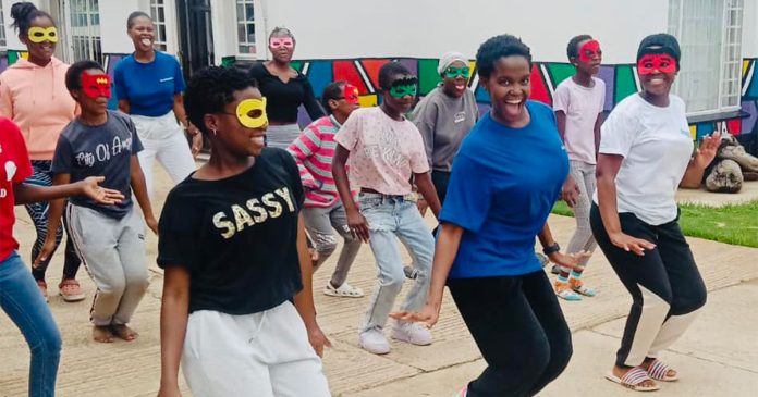 oti-mabuse-mabaso-th Strictly Star Oti Mabuse Dances and Braais with Orphans in SA in Early Christmas Surprise