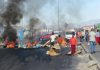 Protesters blocked Japhta Masemola Road in Cape Town on Monday, demanding electricity. Photo: Vincent Lali