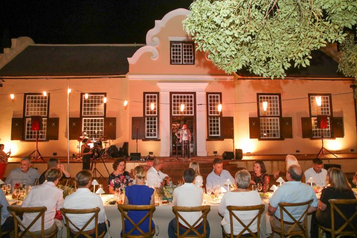 Wine lovers are entertained at a long table in front of Vergelegen’s historic homestead. Photo: A Gorman Photography Wine lovers are entertained at a long table in front of Vergelegen’s historic homestead. Photo: A Gorman Photography