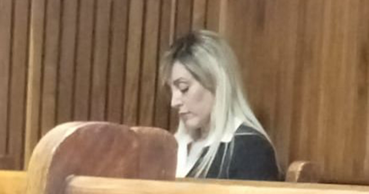 Ruth Lawrence awaiting the arrival of magistrates at Bloemfontein Magistrates Court today. To use any of the text or photos, please contact Jamie Pyatt News Ltd: jamiepyatt@hotmail.com or call +27 64 100 8975 Double murder suspect flies out of South Africa to face trial in Dublin - Ruth Lawrence extradited