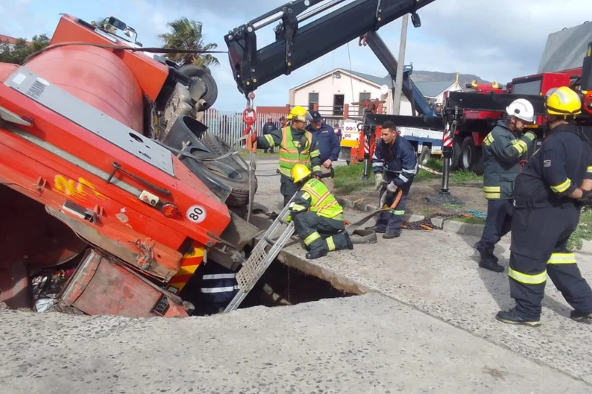 sinkhole swallows rubbish truck