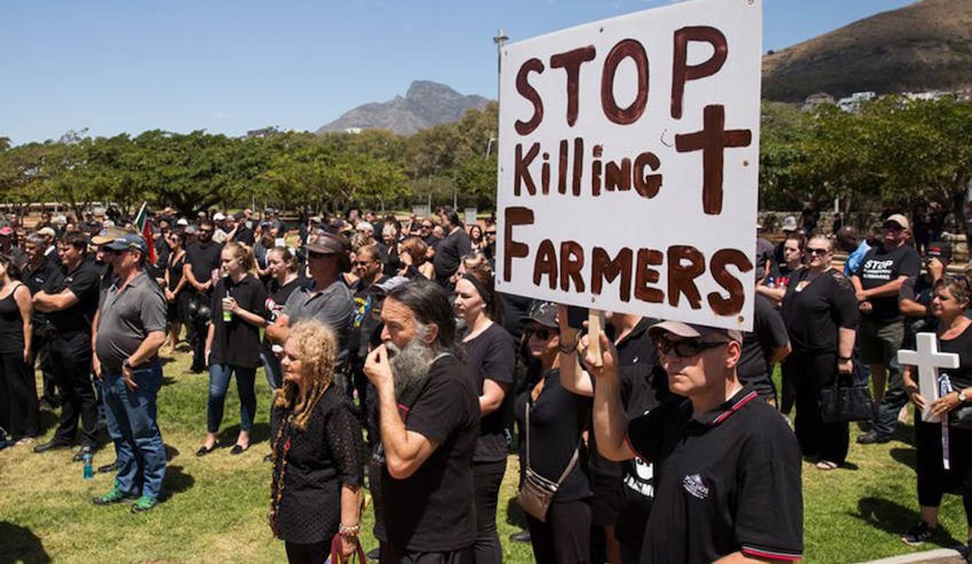 farm murder protests. this image accompanies an article titled 'South Africa logs ONE farm murder as non-fatal attacks drop'