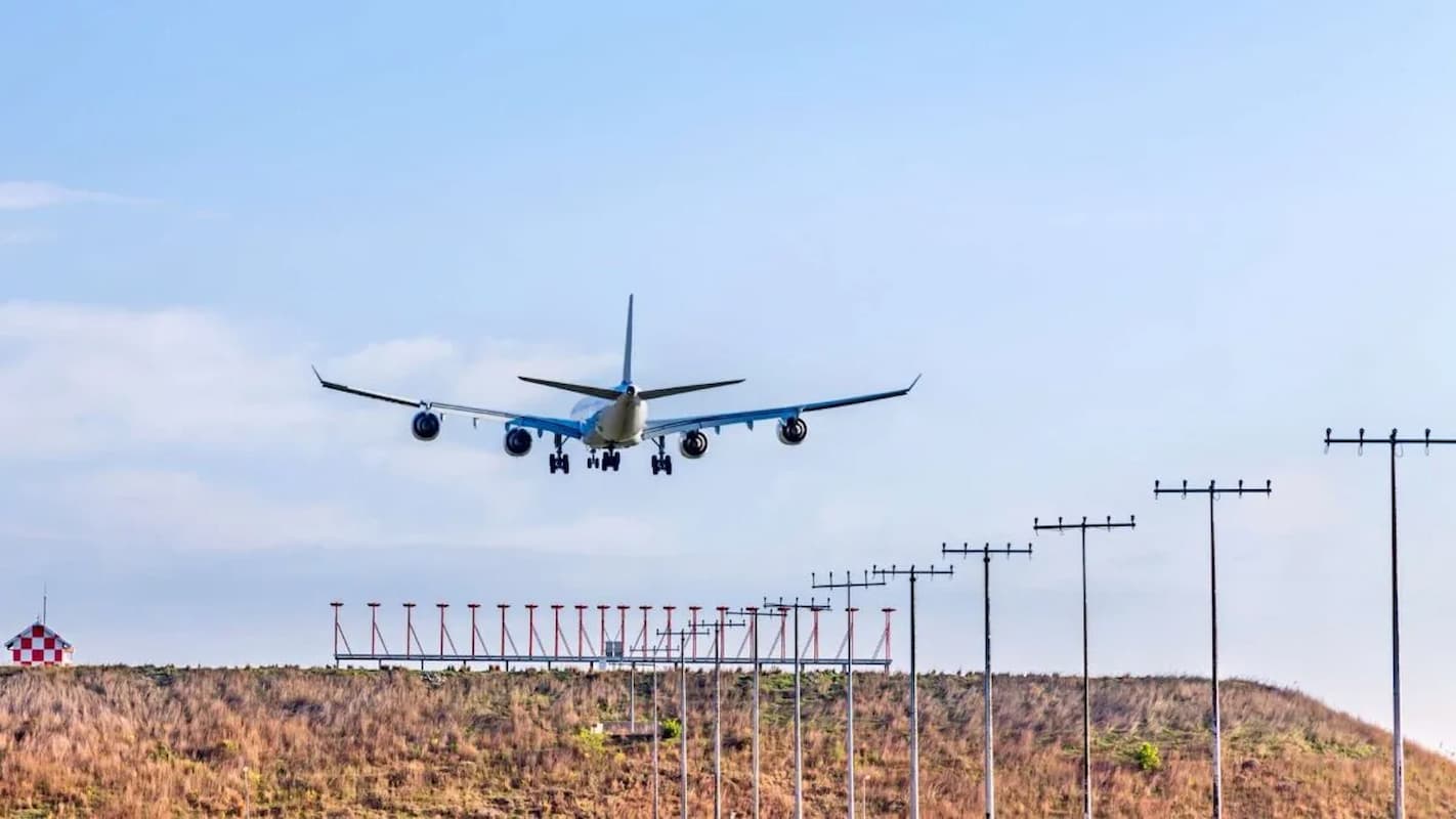 Image of an airplane leaving an airport. This image accompanies an article titled 'Japan hikes permanent residency fees by 2000% '